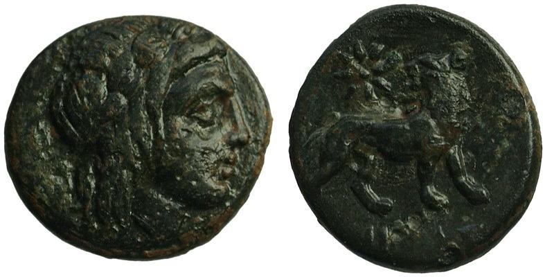 Ionia, Miletos; head of Apollo/lion