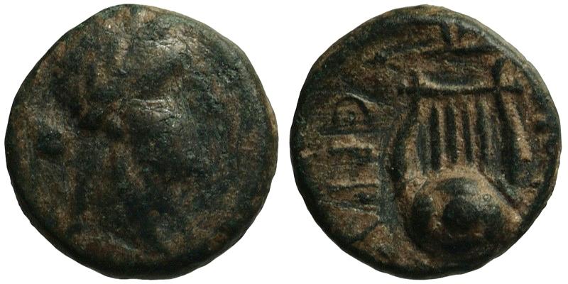 Ionia, Smyrna; head of Apollo/lyre